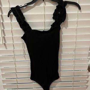Black detailed body suit